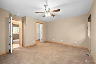 Primary bedroom at end of hall.