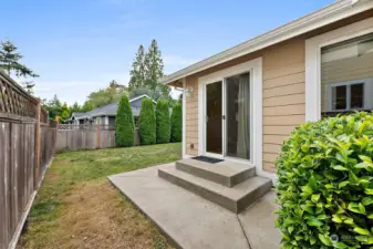 Entry of backyard from eating space inside, perfect for BBQs!