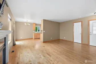 Open floor plan to the kitchen and eating space.