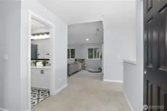 Looking toward bonus room from one of two secondary bedrooms