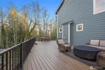 This sitting area looks out over the flat side yard and play structure