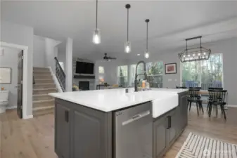 Deep farmhouse sink adds character and charm to this well appointed kitchen