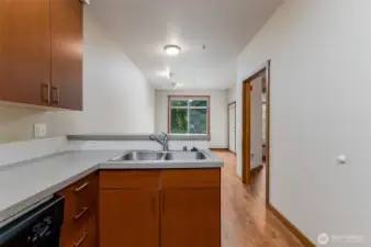 Kitchen is open and flows into living room