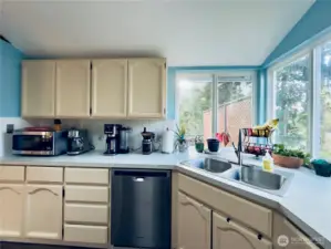 Kitchen is spacious with counter space and cabinets