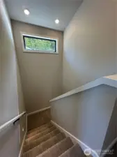 Stairwell with Transom Window for more Natural Light