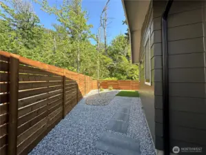 Fully Fenced Backyard with Two Gates