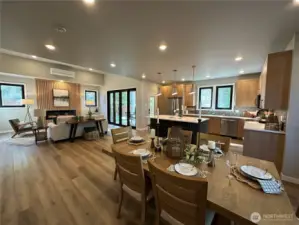 Open floor plan with defined living and dining areas