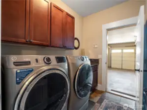 Utility room with cabinets & counter space...the washer and dryer are negotiable.