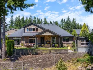 The beautifully landscaped backyard is the highlight of the home...