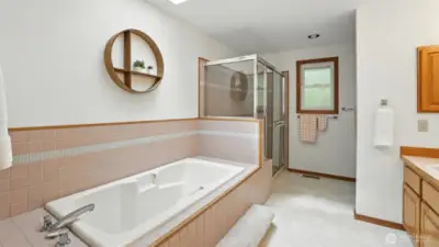 Enjoy this 5 piece master bath with deep soaking tub & separate stand up water closet.