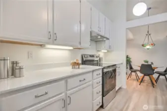 Updated kitchen with new hardware, appliances and countertops.