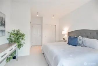 Bedroom with two closets, private door to patio, nice window space and high ceilings.