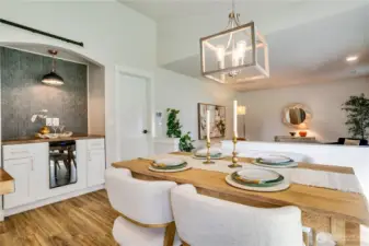 The closed door leads to a roomy two car garage, perfect for unloading groceries and sundries.