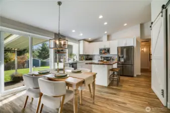 Generous sliders to the extended covered patio for quiet time be it sun or rain.