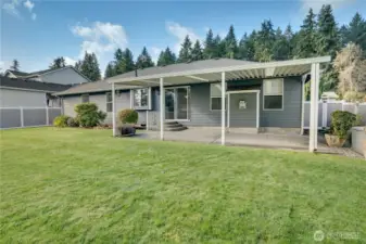 Natural gas generator ready if needed, covered extended patio space, and a feeling of privacy right in a central Puyallup location.