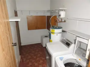 Separate laundry room.