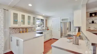 Additional cabinetry offers plenty of storage for everyday essentials.