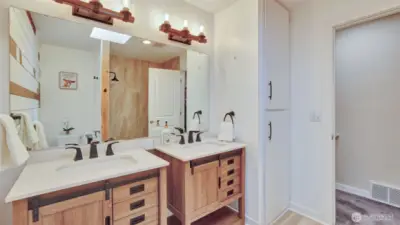 Enjoy extra cabinets and storage for any bathroom belongings.
