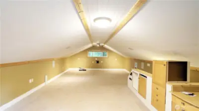 Spacious left/studio above the garage is great for extra storage, art studio, or whatever your lifestyle needs!