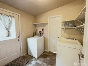 Large Laundry room with back deck access