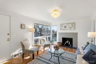 The fireplace anchors the room, creating an easy and comfortable setting for everyday living.