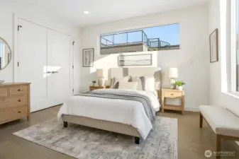 Virtually staged p  rimary bedroom - top floor