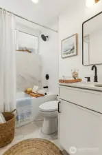 Virtually staged main floor full bath