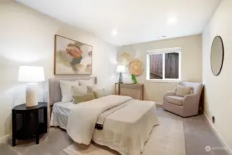 Large fourth bedroom on the lower level would be perfect for guests to have their own separate space.