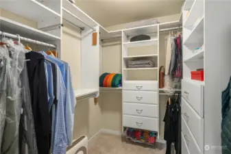Large walk-in closet in primary bedroom, fitted with California Closet system. A real bonus!