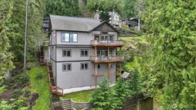 Outside stairs to access each level and storage