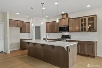 Home is under construction. Photos are of a previously built home from the same community with similar finishes. Builder reserves the right to change features, plans, prices & specifications without notice. Features vary by plan. Buyer to verify square footage.