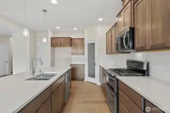 Home is under construction. Photos are of a previously built home from the same community with similar finishes. Builder reserves the right to change features, plans, prices & specifications without notice. Features vary by plan. Buyer to verify square footage.