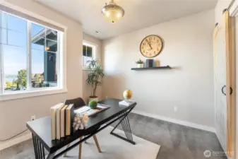 Large office on main with views of the lake. Nice space to work from home!