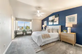 Primary bedroom - spacious, high ceilings and sitting area to take in the lake view.