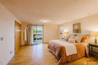 Extra large primary with 2 closets & slider to deck