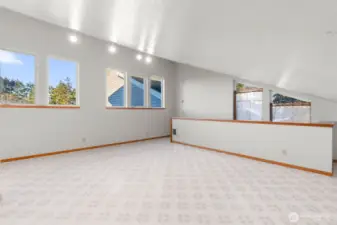 SUPER BONUS - Large finished room over garage with its own entrance
