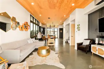 The living room is spacious and open. The concrete floors warm your feet and give such a modern living feeling