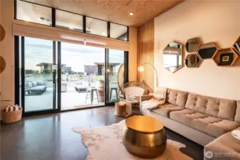 From the living room you can open the massive sliding doors to your outdoor living area.