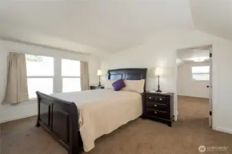 Upstairs Primary Suite with Walk-in closet, full bath and kitchenette with sitting area