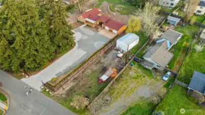 Adjoining lot to the right is available for sale as well and includes the shop. 1.57 acre total with both lots, inquire with listing agent for lot details