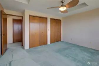 Large double closets, with lighting, in primary bedroom.