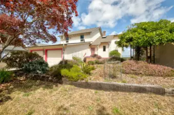 Front yard is terraced and landscaped.