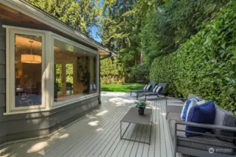 Another view of the expansive deck with the level play yard in the distance.