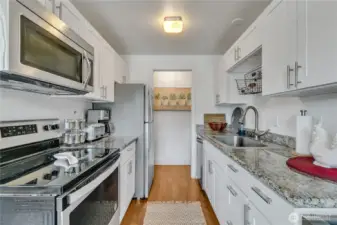 Remodeled kitchen with granite countertops, shaker cabinetry and stainless steel appliances - beautiful!