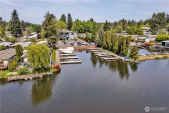 Aerial View of the waterfront, docks and Condo Building