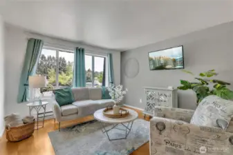 Living room towards expansive window appeal