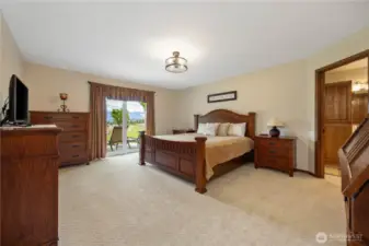 Primary Bedroom with west facing views of lake and mountains