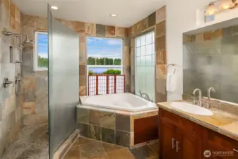 5-Piece Primary Suite bathroom with slate tile and beautiful lake view.