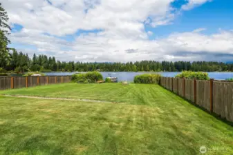 Level lawn to 75' of lakeside living. Fenced yard for privacy.