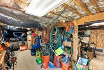 Work shop under the home is approx 450 sq ft & has a wine room & more crawl space for storage